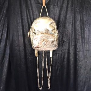 Laurel Dewitt gold textured fashion mini backpack